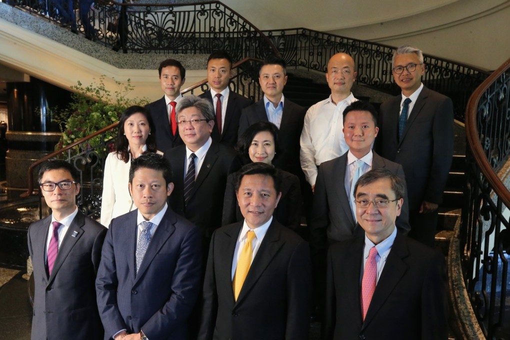 (front row left to right): Jeffrey Chan, FCPA, Councillor, CPA Australia; Eugene Tang, South China Morning Post; Herbert Vongpusanachai, Senior Vice President, Managing Director, DHL Express Hong Kong and Macau; and Professor Richard Wong, Professor of Economics, the University of Hong Kong. (middle row left to right): Iris Wong, Director, Belt and Road & External Relations, Hong Kong Trade Development Council; Samson Lam, Executive Chairman, VPower Group International Holdings Limited; Lianne Ng, Group Director, External Affairs & Sustainability, Vitasoy International Holdings Limited; and David Pun, Chairman & CEO of EVISU Group Limited. (back row left to right): Ronald Kan, 2018 National President, Junior Chamber International Hong Kong; Lap Man, Founder and Chief Executive Officer, DYXnet Group; Ray Chan, President of Central Business Information Limited; Zhou Jiaxing, Managing Director & Head of Legal, China International Capital Corporation Limited; and Terence Chiu, Head of Comm
