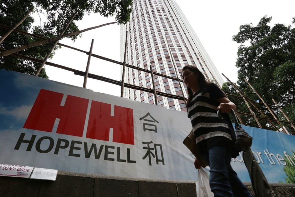 Hoardings fence off the building site for Hopewell Centre II, against the backdrop of the original Hopewell Centre, in Wan Chai in August 2014. Photo: Nora Tam