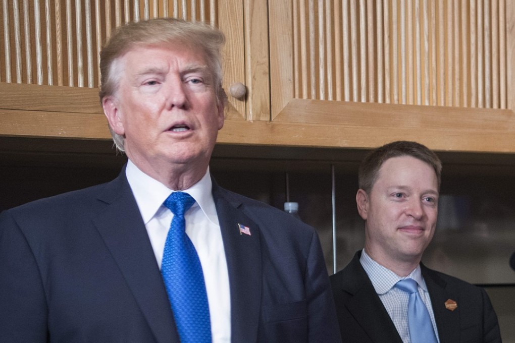 United States President Donald Trump stands with senior director for Asian Affairs at the National Security Council, Matthew Pottinger. Photo: AFP