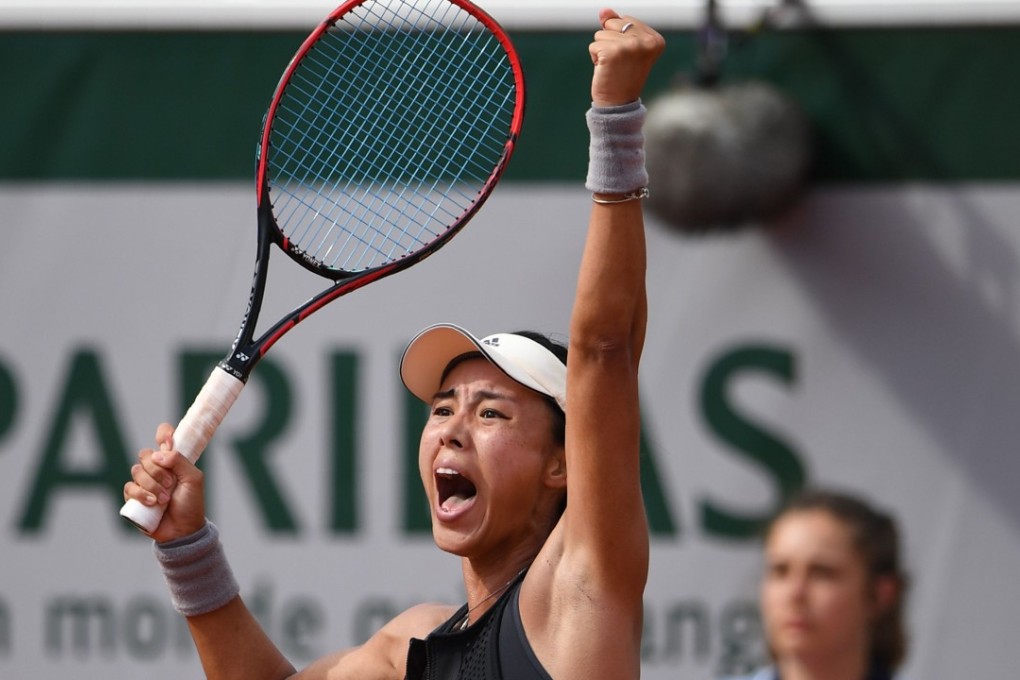 China's Wang Qiang celebrates after beating American Venus Williams at the French Open. Photo: AFP