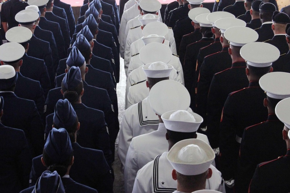 Members of the military attend the change-of-command ceremony for the US Pacific Command in Pearl Harbour. Photo: AFP