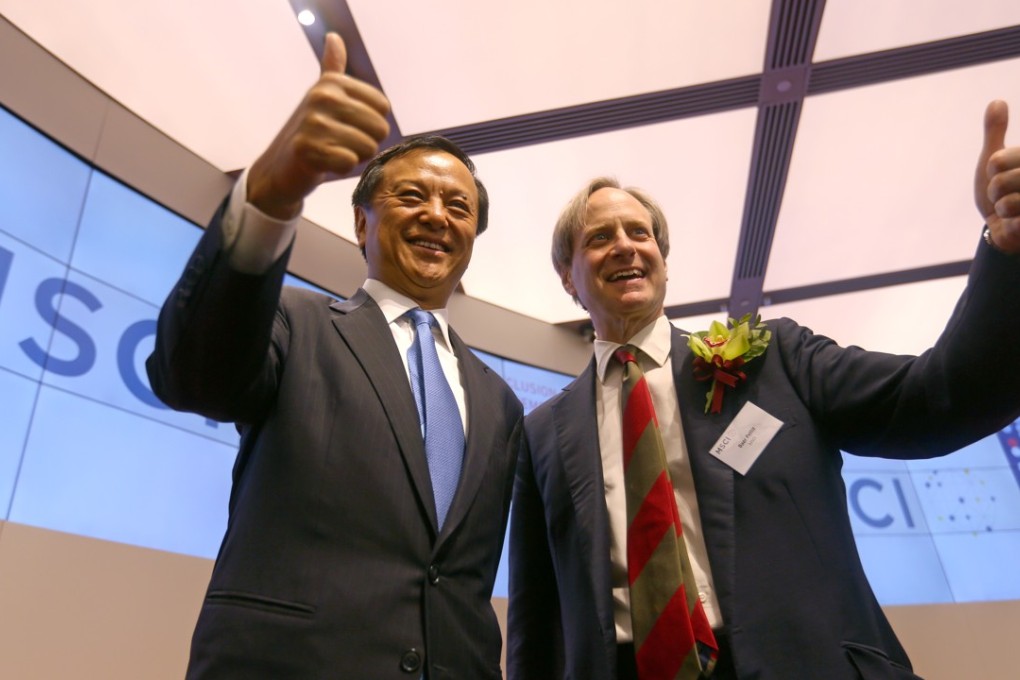 Hong Kong Exchanges and Clearing chief executive Charles Li Xiaojia (left) with MSCI president Baer Pettit. Photo: SCMP