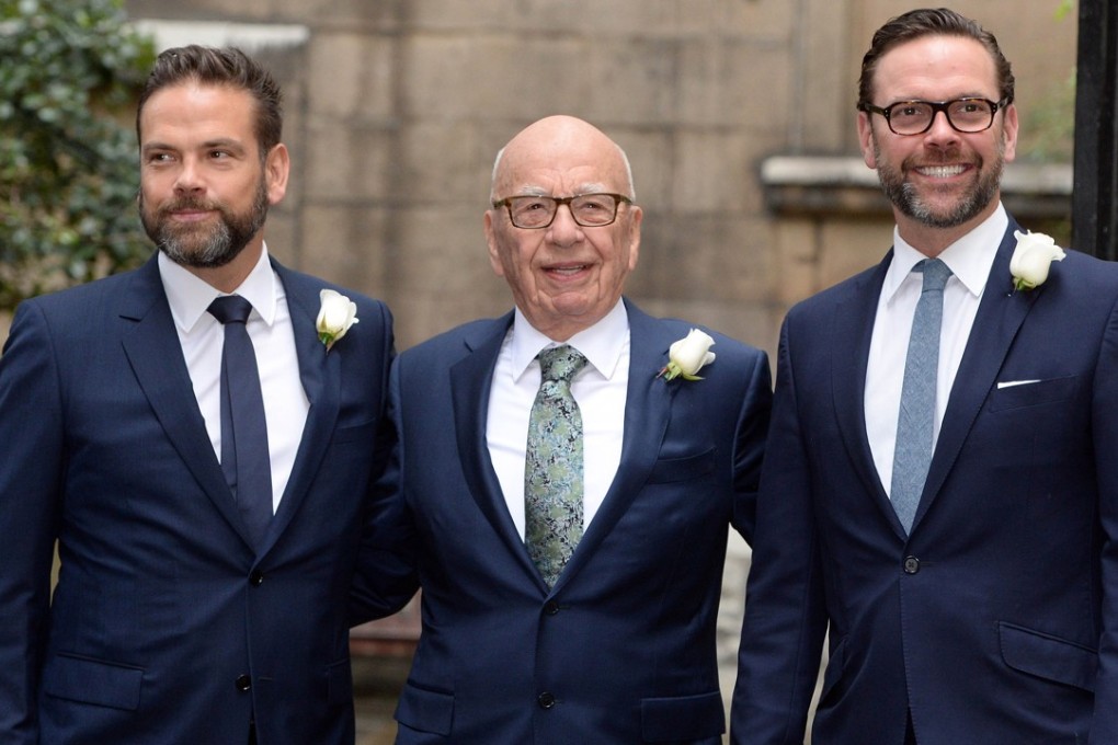 Fox CEO James Murdoch, right, with his father Rupert and brother Lachlan in 2016. James has not been shy about expressing his support for Disney over Comcast. Photo: i-Images/Zuma Press/TNS
