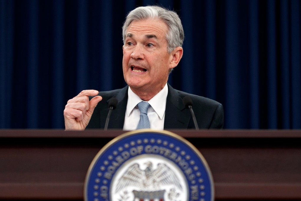 Federal Reserve chairman Jerome Powell speaks following the Federal Open Market Committee meeting in Washington on March 21. Moves by the Fed and other major central banks to raise interest rates after a long period of keeping them low should not be disruptive to the global economy, Powell said. Photo: AP