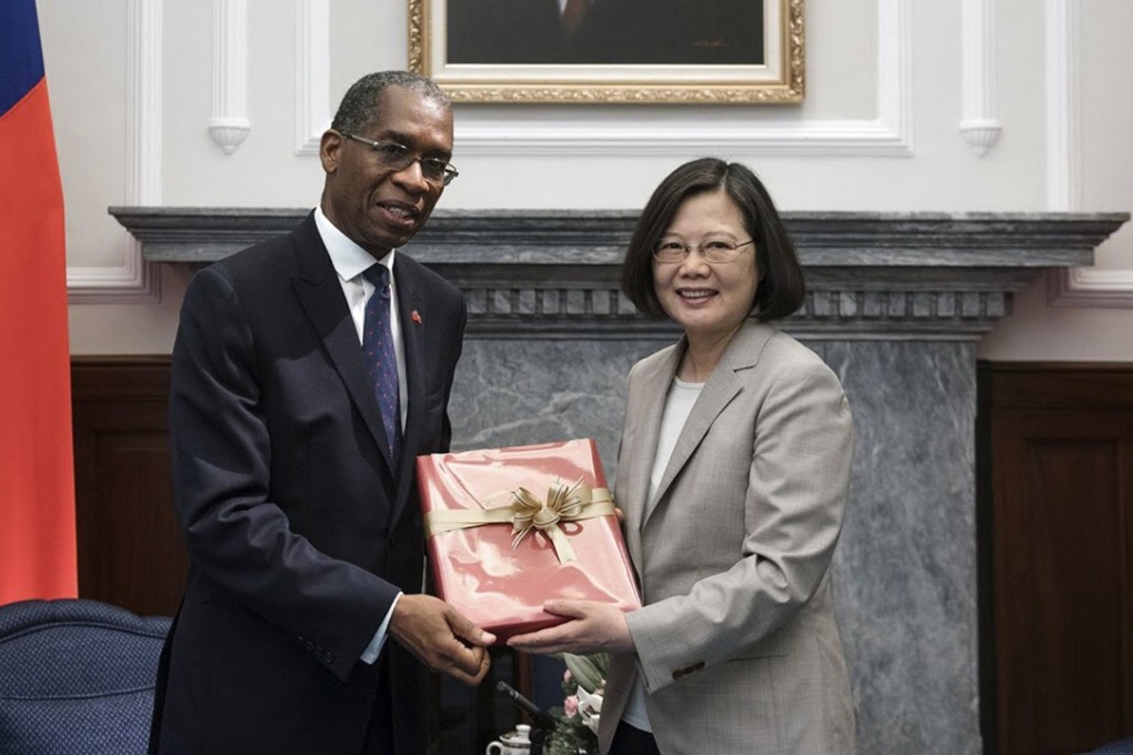 Taiwanese President Tsai Ing-wen (right) welcomes Haitian Foreign Minister Antonio Rodrigue during his visit to Taipei in April. Photo: EPA-EFE