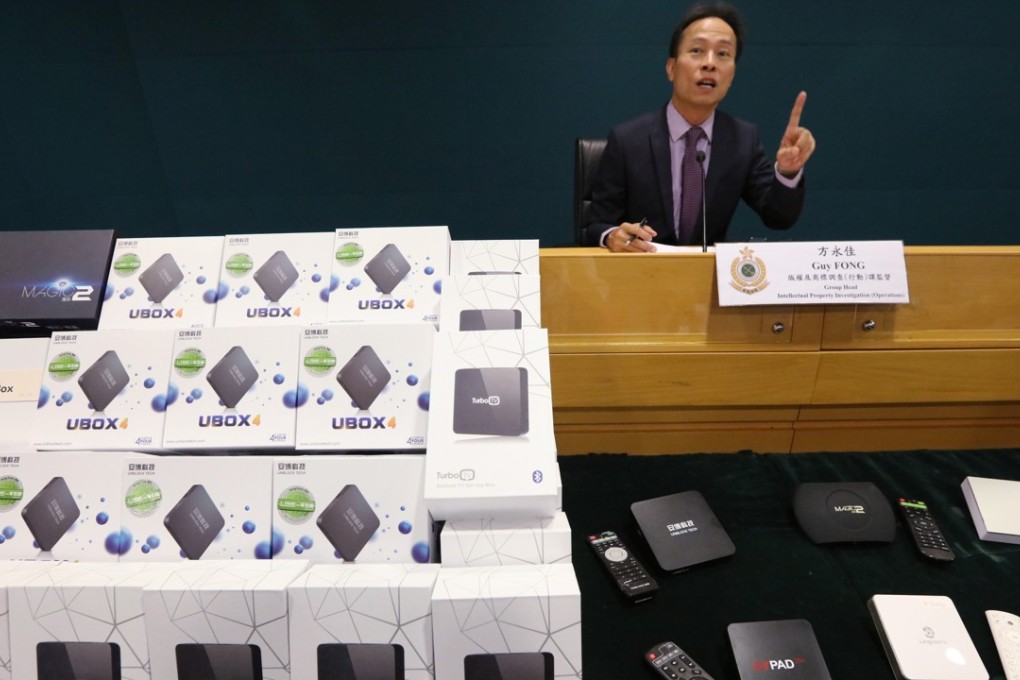 Guy Fong Wing-kai, head of the Customs and Excise Department’s intellectual property investigation group, at a press conference on operations to combat the sale of suspected illicit TV set-top boxes, in North Point on May 28. Photo: Felix Wong