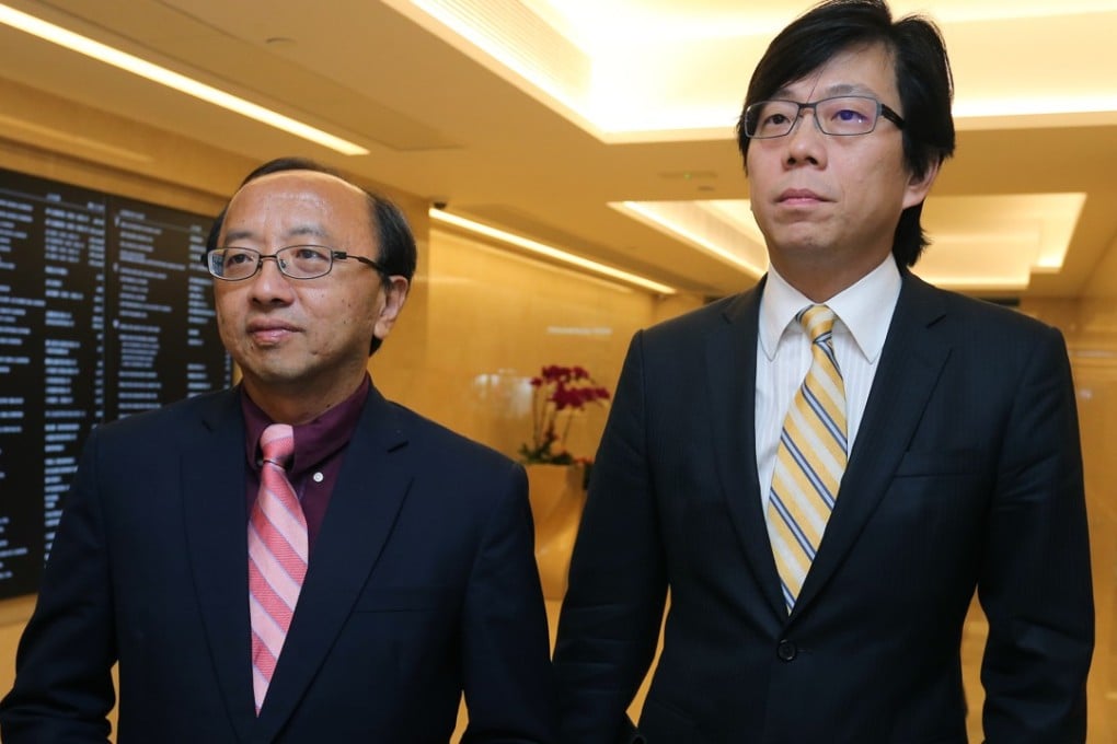 Eric Cheung (left) and Kenneth Lam arrive at the Law Society's office in Central. Photo: Dickson Lee