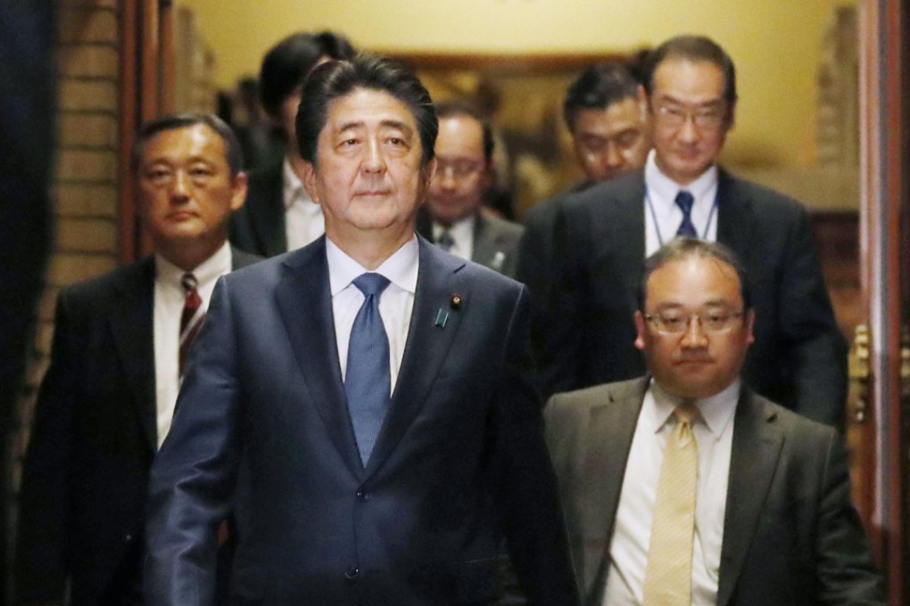 Japanese Prime Minister Shinzo Abe walks out of his official residence to meet journalists in Tokyo on May 28 after a phone call with US President Donald Trump. Photo: AP