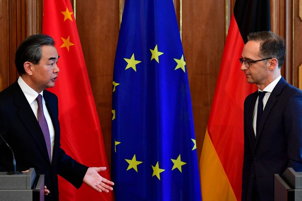 Chinese Foreign Minister Wang Yi and his German counterpart Heiko Maas react after a press conference in Berlin on Thursday. Photo: AFP
