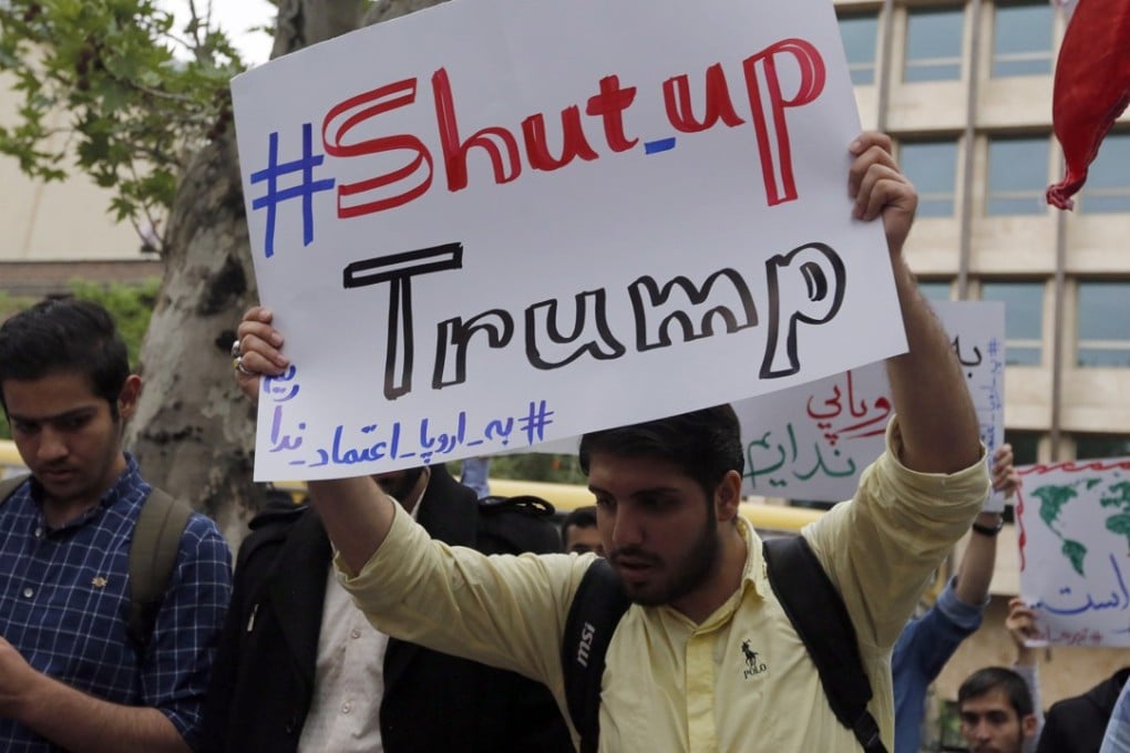 Iranians take part in an anti-US protest in front of the former US embassy in Tehran, on May 9. The previous day, President Donald Trump announced that the US would withdraw from the Iran nuclear deal, an agreement to prevent the Islamic republic from developing nuclear weapons. Photo: EPA