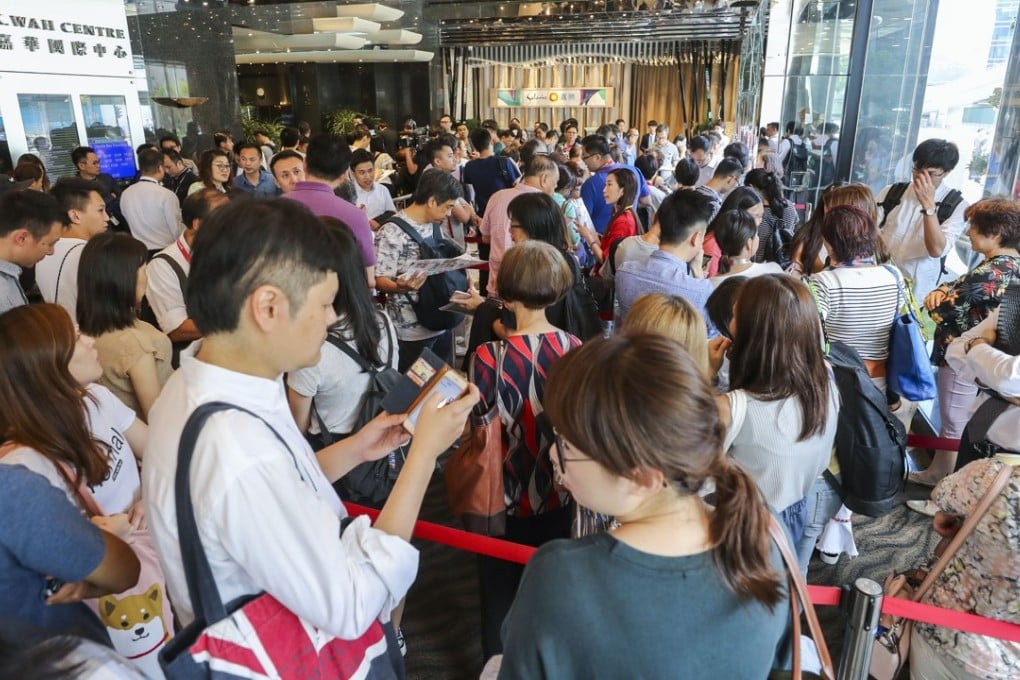 Potential buyers queue up as K. Wah offer 238 units at Solaria for sale at K. Wah Centre in North Point on 2 June 2018. Photo: SCMP/Winson Wong