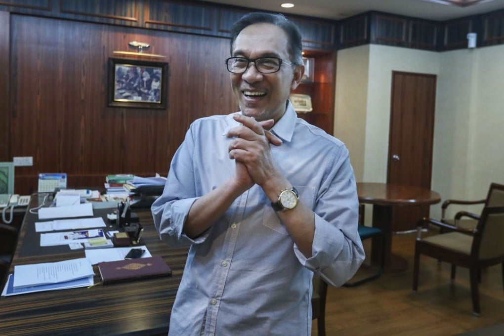 Newly released Malaysian political veteran Anwar Ibrahim gestures in his office at the People's Justice Party's headquarters, at Merchant Square, Petaling Jaya, Malaysia. Photo: Nora Tam