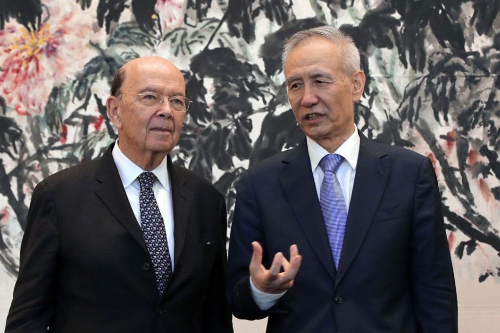 US Commerce Secretary Wilbur Ross (left) chats with Chinese Vice-Premier Liu He after their meeting at the Diaoyutai State Guest House in Beijing on Sunday. Photo: AP