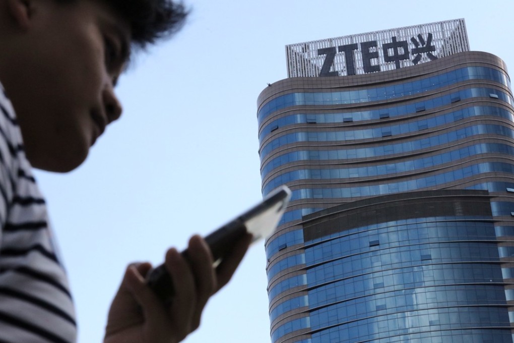 A man walks past the ZTE Headquarters in Shenzhen. Photo: SCMP