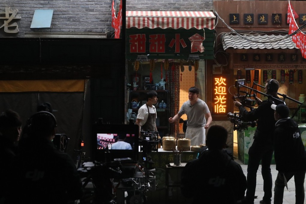 Actors on set at a 10,000-square-meter film studio pavilion of Wanda Oriental Movie Metropolis in Qingdao, Shandong province on 28 April 2018. Photo: EPA-EFE/WU HONG