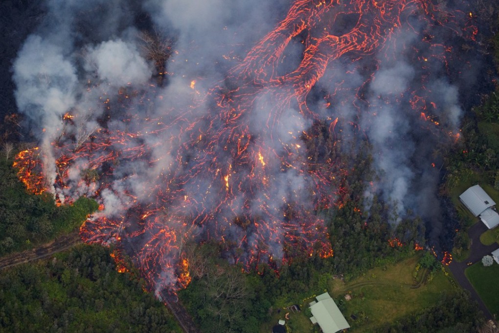 Kilauea's lower east rift zone eruption continues, with lava wandering towards the coast, on May 31. Photo: Paradise Helicopters via EPA-EFE