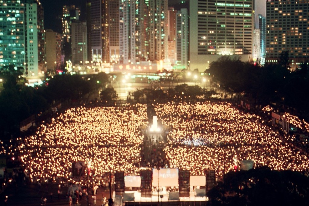 More than 12,000 people hold a candlelight vigil in Victoria Park to commorate the Tiananmen Square crackdown that occurred on June 4, 1989 in Beijing, where Chinese soldiers opened fire on students who demanded democratic reforms.