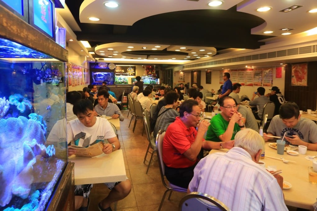 A busy night at Yat Lok Barbecue Restaurant in Tai Po, which has closed after 61 years serving its highly rated roast goose. Photo: Paul Yeung