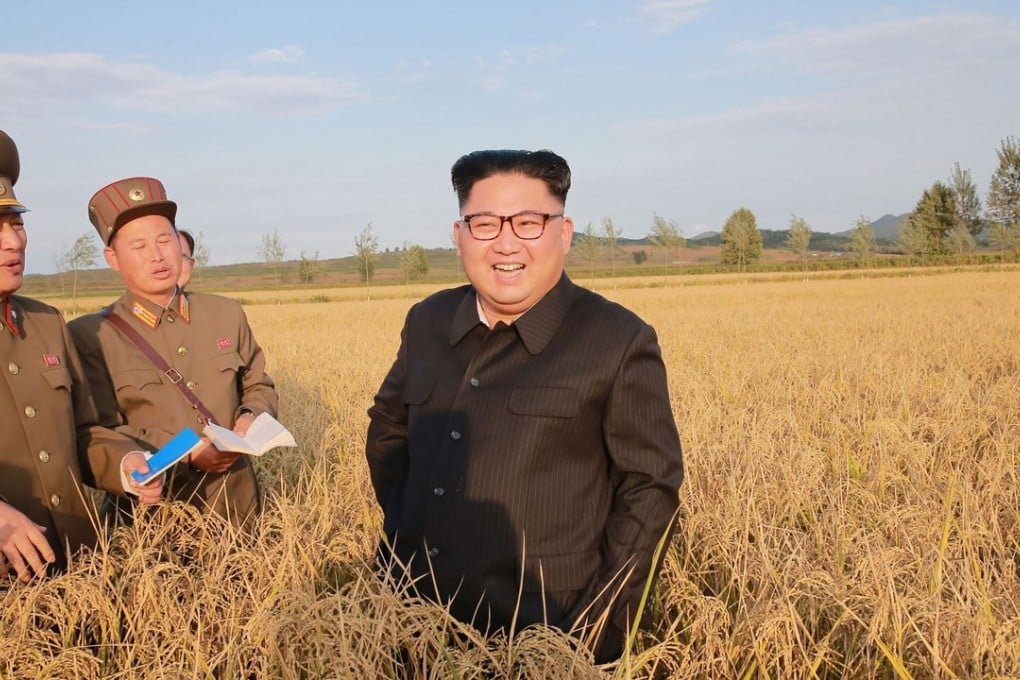 North Korean leader Kim Jong-un visits a farm with members of the Korean People’s Army in a photo released at the same time as tougher UN sanctions were announced. Photo: AFP/KCNA via KNS
