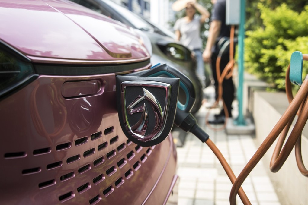 A Baojun E100 electric vehicle plugged into a charging station. GM and its partners sold four million vehicles in China in 2017, about 1 million more than the carmaker sold in the US. Photo: Bloomberg