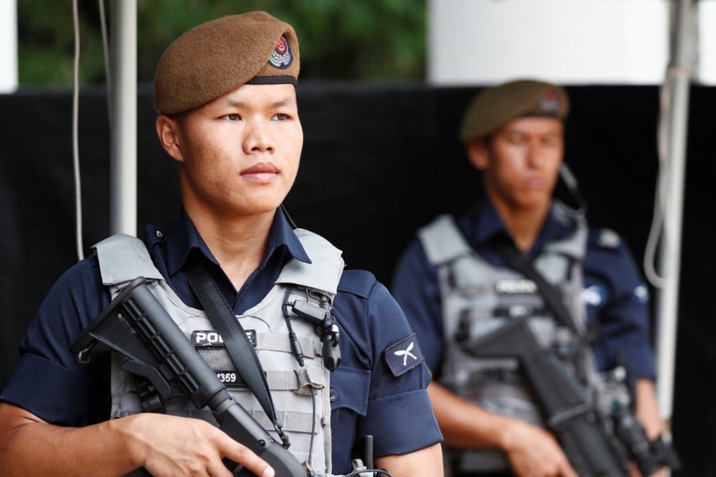 Gurkhas man a checkpoint at the IISS Shangri-La Dialogue in Singapore on June 1. The specialised force is expected to be deployed for the summit between Kim Jong-un and Donald Trump on June 12. Photo: Reuters