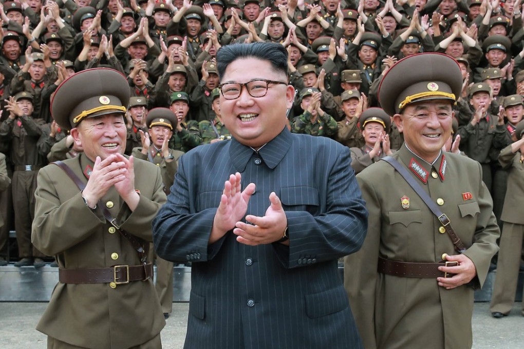 North Korean leader Kim Jong-un with military officers. Photo: AP