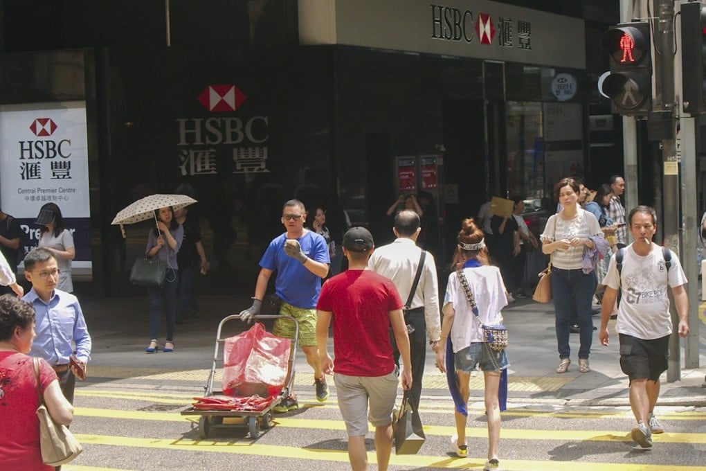 Jaywalkers at the junction of Queen’s Road Central and Wyndham Street in Hong Kong on a recent hot day in May. Photo: Stuart Heaver