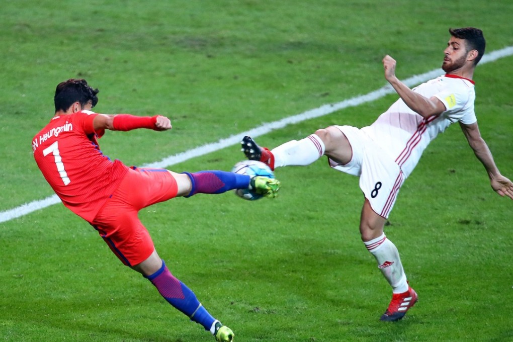 South Korea’s Son Heung-min in action against Iran’s Morteza Pouraliganji during Fifa World Cup qualifying. Photo: EPA