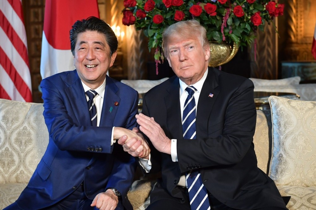 US President Donald Trump greets Japanese Prime Minister Shinzo Abe at their last meeting in May. Abe is again headed to Washington to try to make sure Trump does not overlook Japan’s security and diplomatic concerns at next week’s US-North Korea summit in Singapore. Photo: AFP