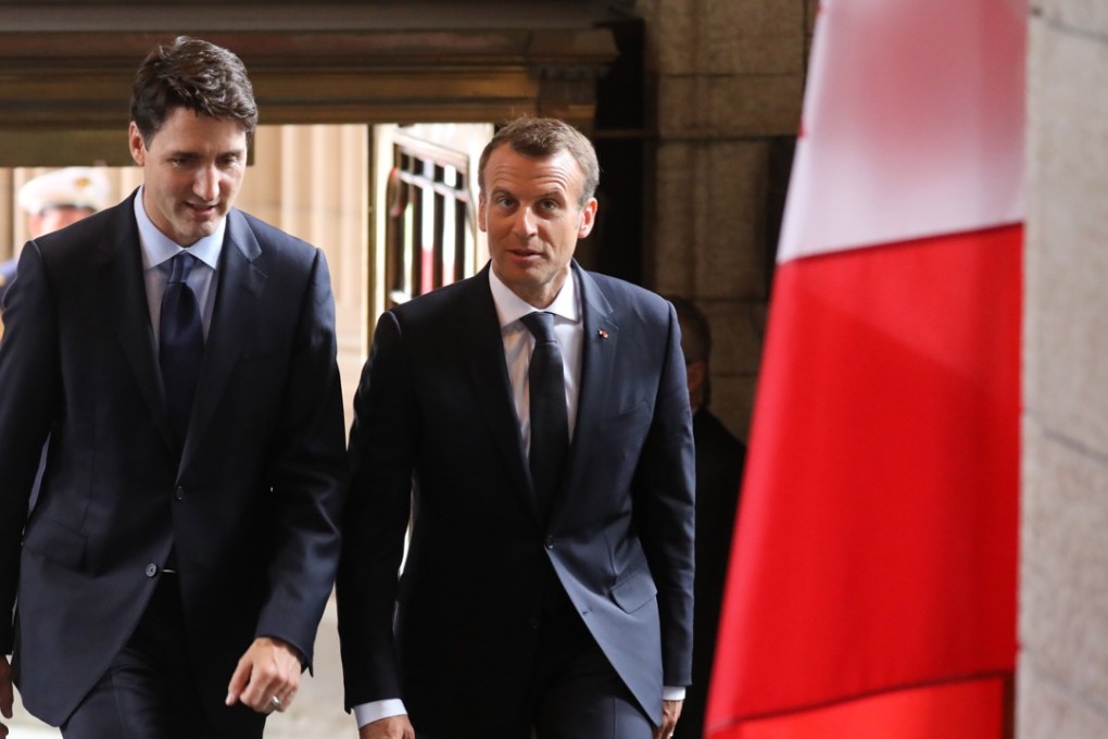 Canadian Prime Minister Justin Trudeau welcomes French President Emmanuel Macron in Ottawa ahead of a G7 summit in Quebec later this week. Photo: EPA