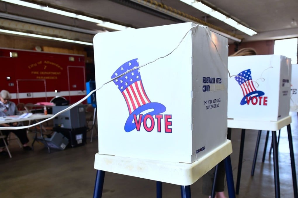 A woman casts her vote at a polling station inside the Alhambra Fire Department in Alhambra, Los Angeles County, California on June 5, 2018 as Californians go to the polls today to vote on key primary elections. Photo: AFP
