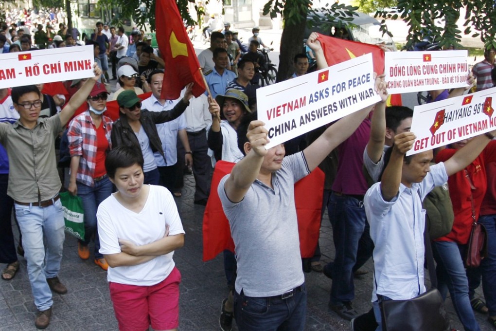 Vietnamese protest against China’s deployment of an oil rig in the disputed South China Sea. Photo: AP