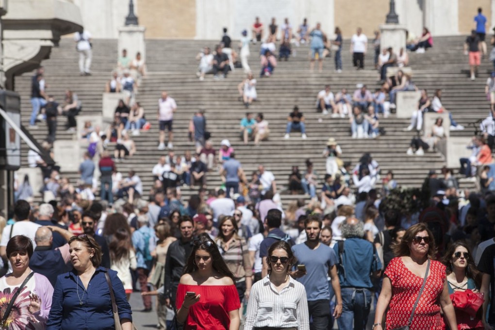 People at Piazza di Spagna in Rome, Italy, on May 12. Financial markets reacted negatively to the formation of a populist government in a country which has Europe’s second-largest public debt burden. Photo: Bloomberg