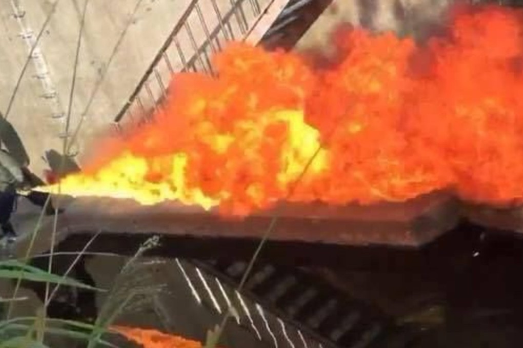 A photograph taken from Sun An-tso's Facebook account shows him using a flame thrower. Photo: Sun An Tso/Facebook via Yahoo! News Taiwan