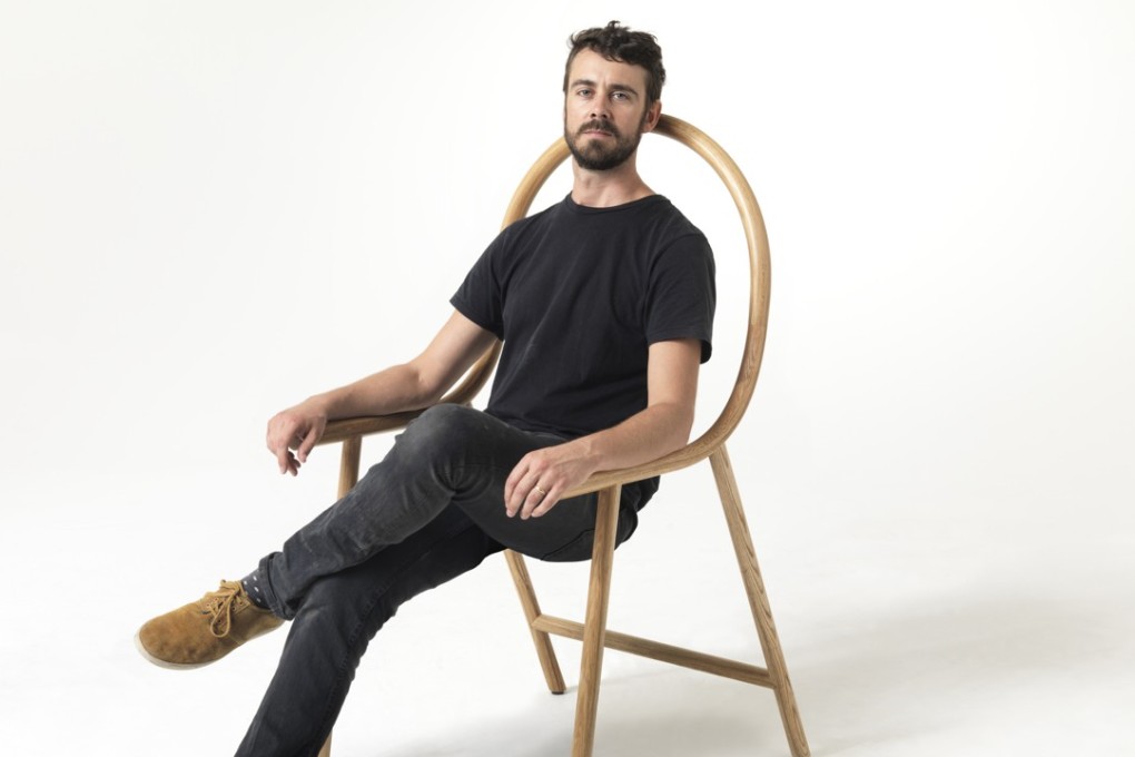 New Zealand furniture designer Clark Bardsley and his Arm chair.