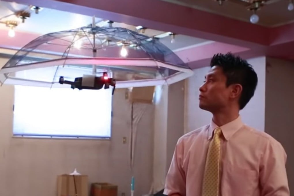 Look, no hands! Asahi Power Service is testing drone umbrellas. Photo: Internet