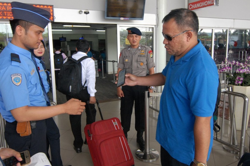 Security checks at the international airport in Cengkareng on the outskirts of Jakarta. Photo: AFP