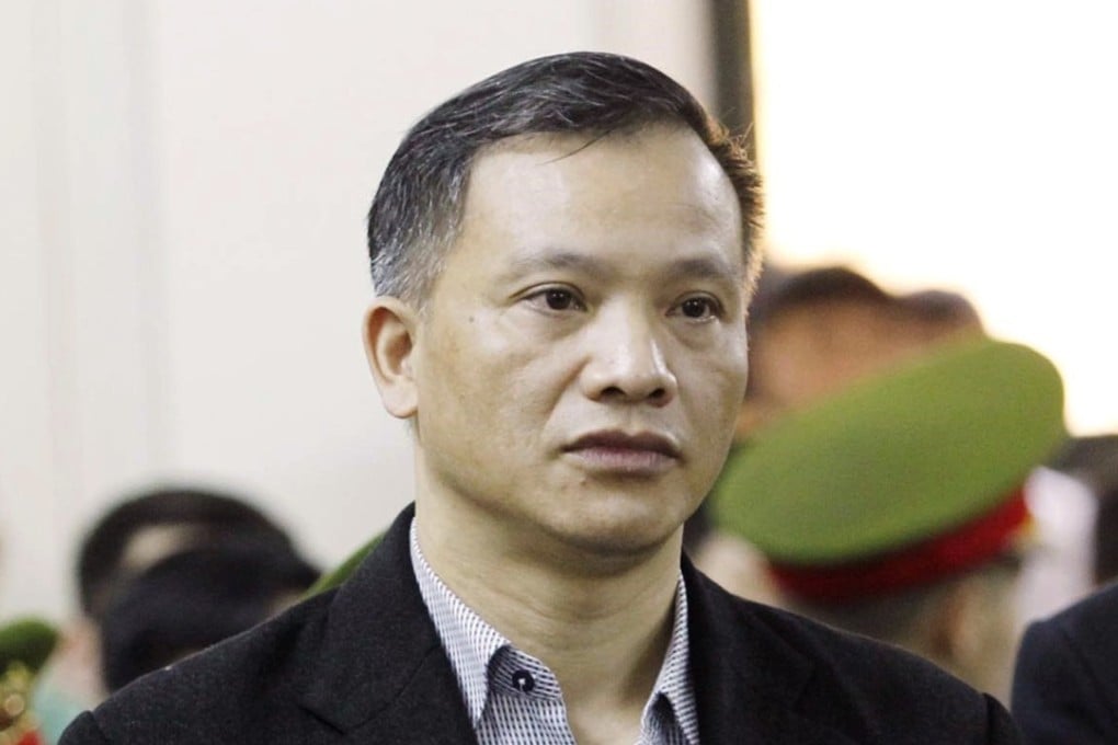 Prominent human rights lawyer Nguyen Van Dai stands trial in Hanoi, Vietnam. He and another alleged dissident were kicked out of the country to Germany. Photo: AP