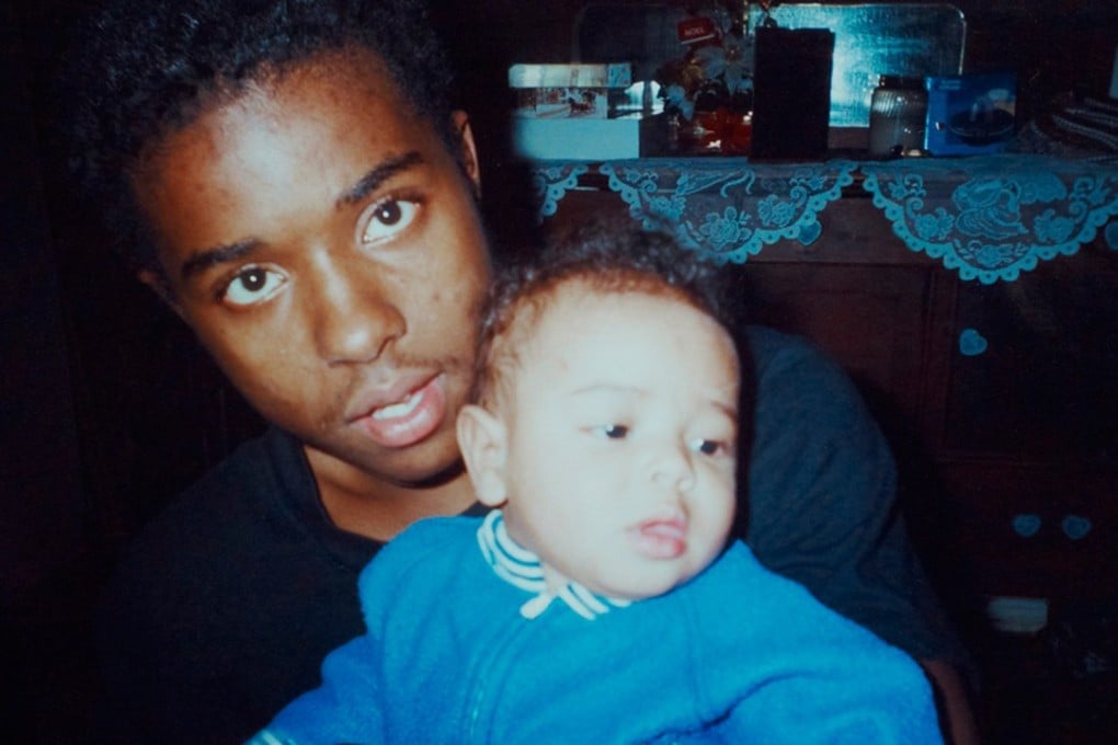 Andre Thomas Snr is seen with his son, Andrew Lee, in an undated photograph. The child was killed by his father on February 15, 2005, along with his mother and step-sister. Thomas said God told him to commit the murders. Photo: the Boren family via the Texas Tribune