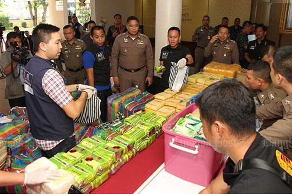 Packages containing speed pills, crystal meth, ecstasy and ketamine worth about 100 million baht (US$3.12 million) on the streets on display at a police press briefing at the Metropolitan Police Bureau in Thailand. Photo: Thai Police