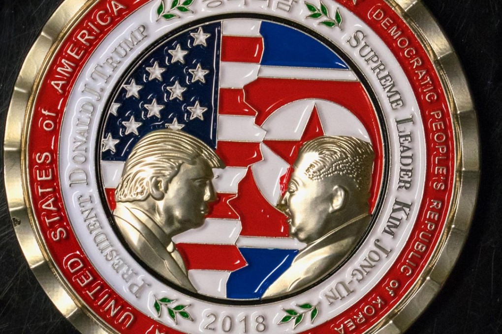 A coin celebrates the upcoming US-North Korea summit. Photo: AFP