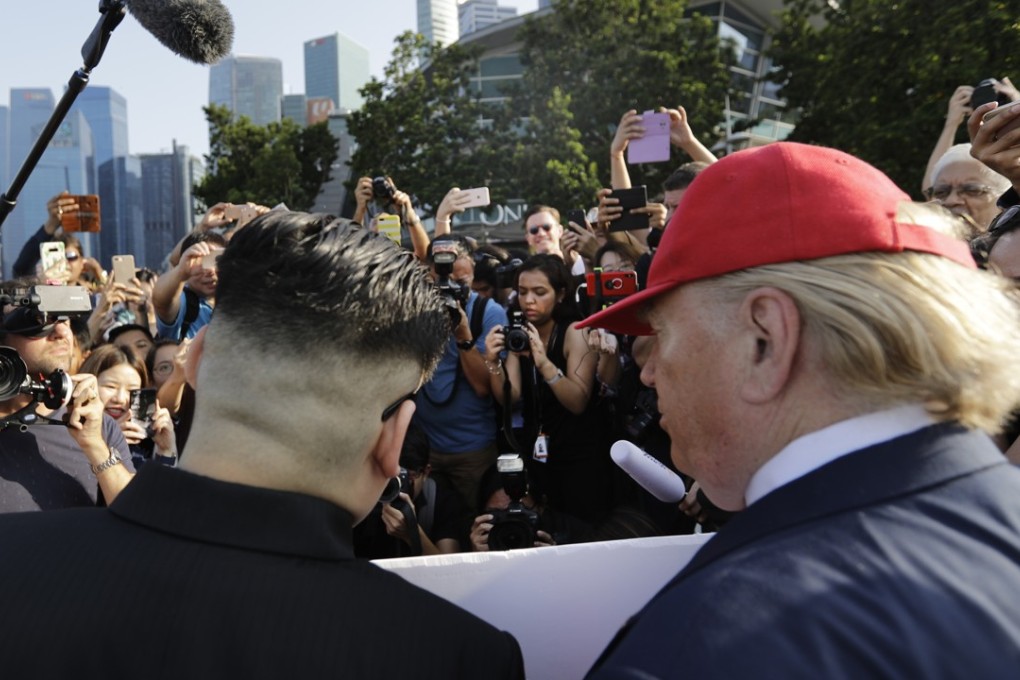 Kim Jong-un and Donald Trump impersonators in Singapore. Photo: AP