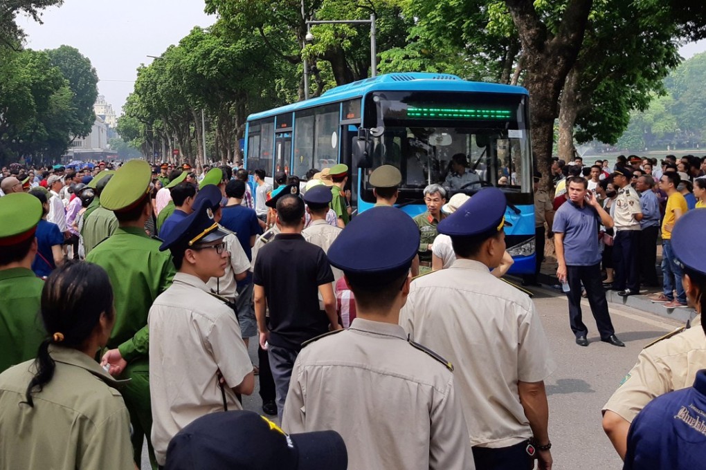 Police later bundled more than dozen protesters into vehicles and drove away. Photo: Reuters