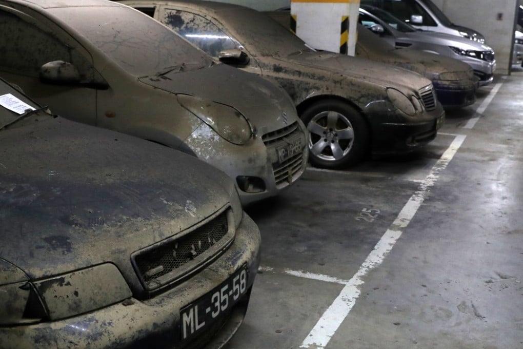 Damaged vehicles left at a basement car park near the Macau-Zhuhai border reflect a growing problem with the city’s infrastructure. Photo: K.Y. Cheng