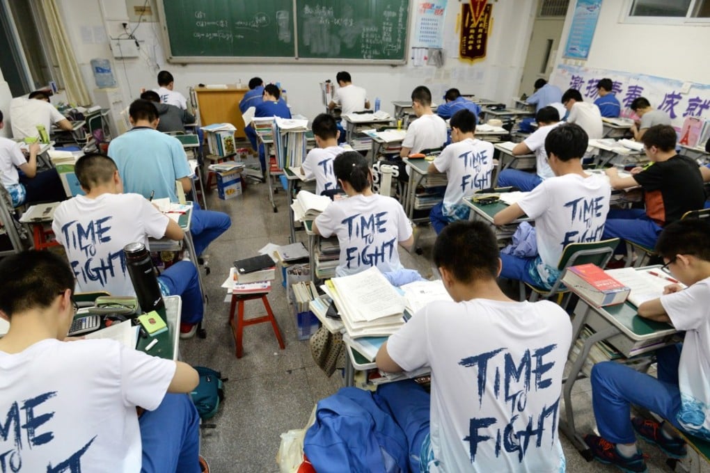 Chinese high school students study late at night for the annual ‘gaokao’ or college entrance examinations in Handan, China on May 23. Photo: EPA-EFE