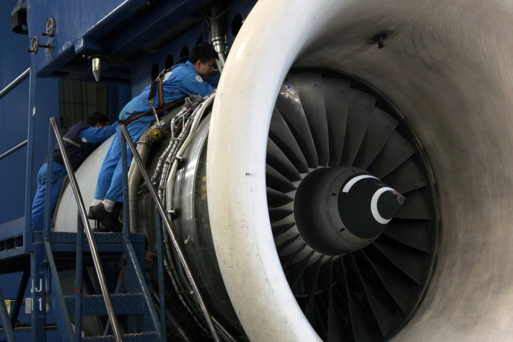 A Haeco technician works on an engine at the company’s workshop in Tseung Kwan O industrial park. Swire Pacific, the parent company, announced on Sunday it would make a general offer to shareholders for the 25 per cent of the company that it does not already own. Photo: Nora Tam