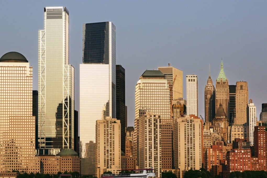 3 World Trade Center (second left), an 80-storey office building, set to open on Monday will be the third completed skyscraper at the trade centre site. Photo: AP Photo
