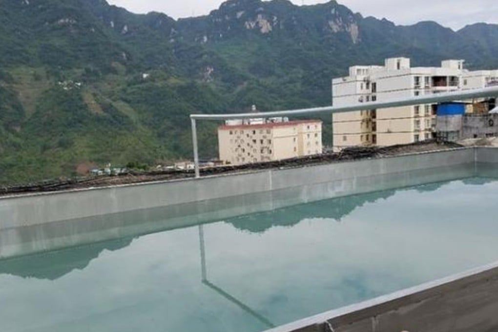 A pool built on top of a six-storey housing block in southwest China held over 40 tonnes of water. Photo: Qq.com