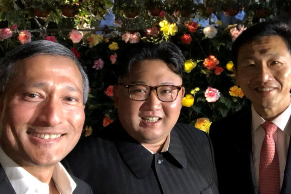 Singapore's Finance Minister Vivian Balakrishnan, North Korean leader Kim Jong-un, and Singapore's Education Minister Ong Ye Kung pose for a photo in Singapore June 11, 2018, in this photo obtained from social media. MANDATORY CREDIT. Vivian Balakrishnan's Twitter page/via REUTERS THIS IMAGE HAS BEEN SUPPLIED BY A THIRD PARTY. NO RESALES. NO ARCHIVES MANDATORY CREDIT.