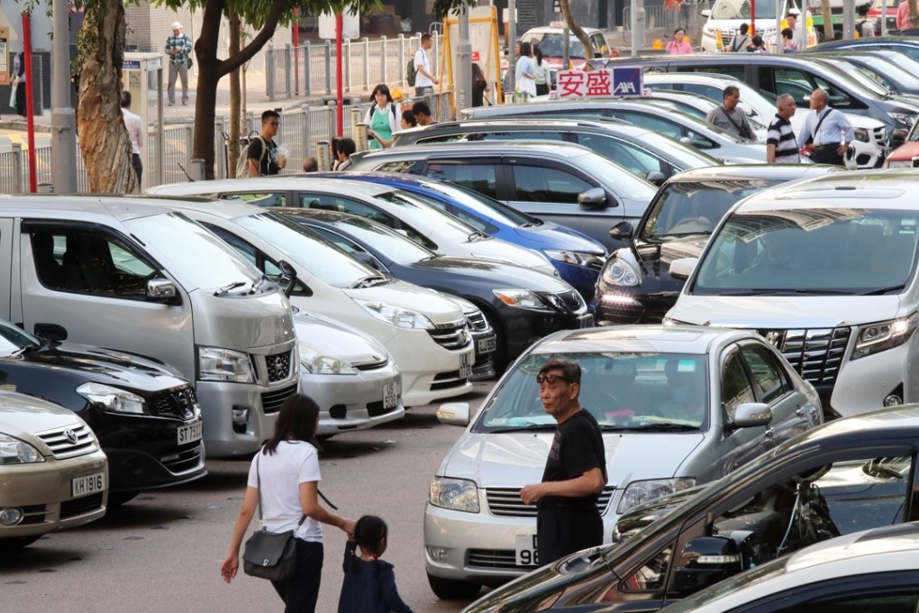 Cars queuing to find spaces at a car park in Causeway Bay, Hong Kong. Photo: K. Y. Cheng